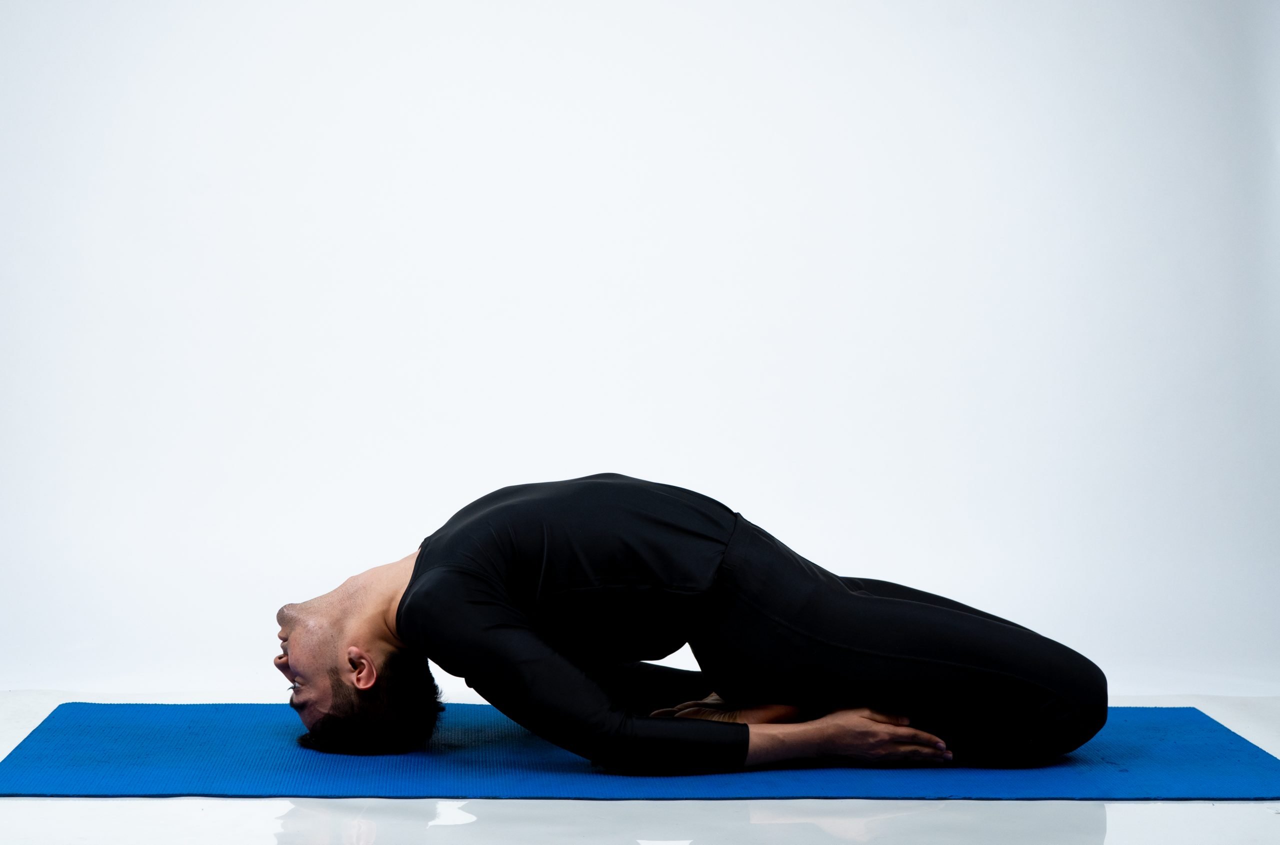 10 Yoga Poses for Digestion to Ease Tummy Troubles | YouAligned.com